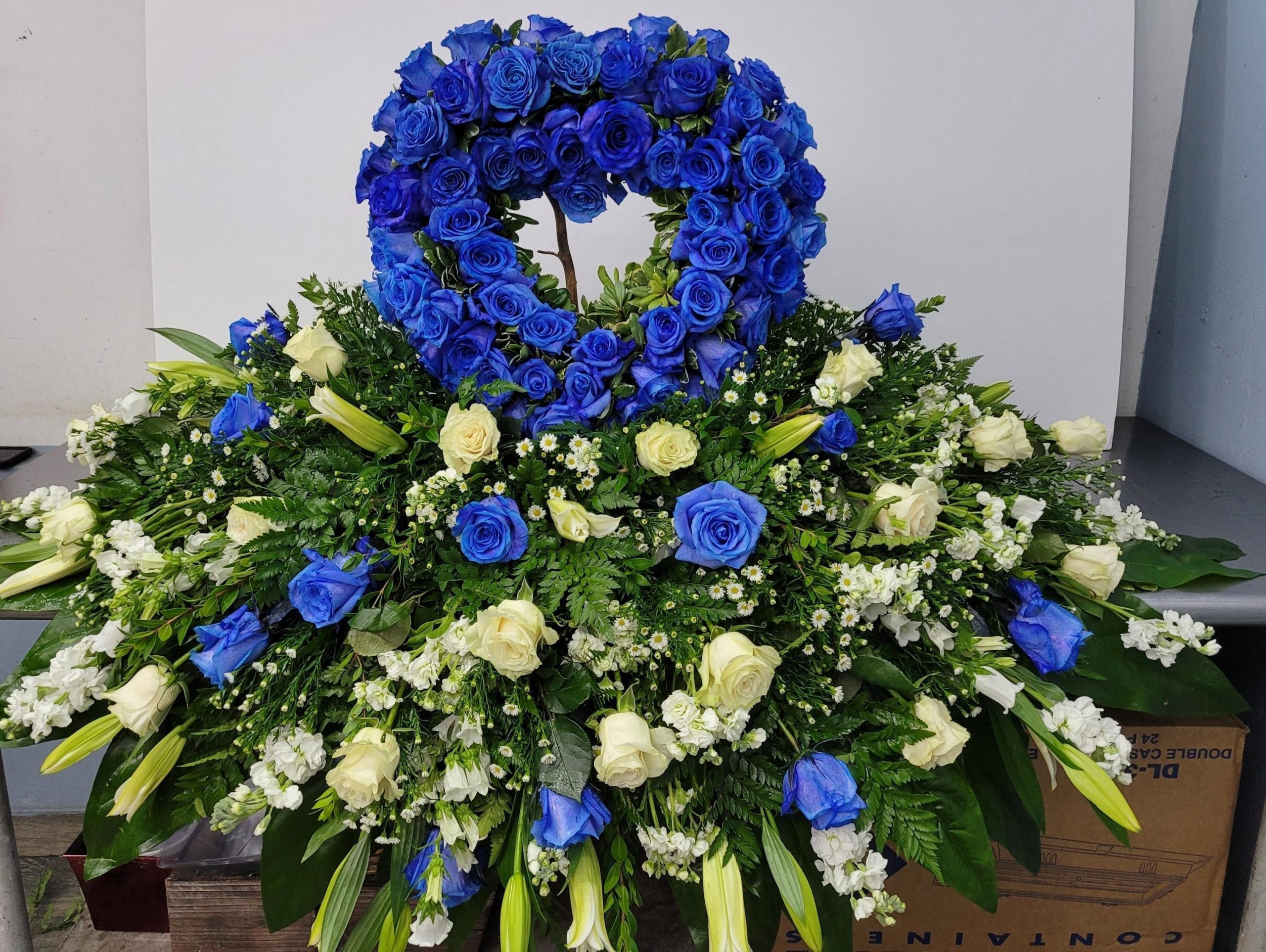 2009 CASKET CON CORAZON AZUL